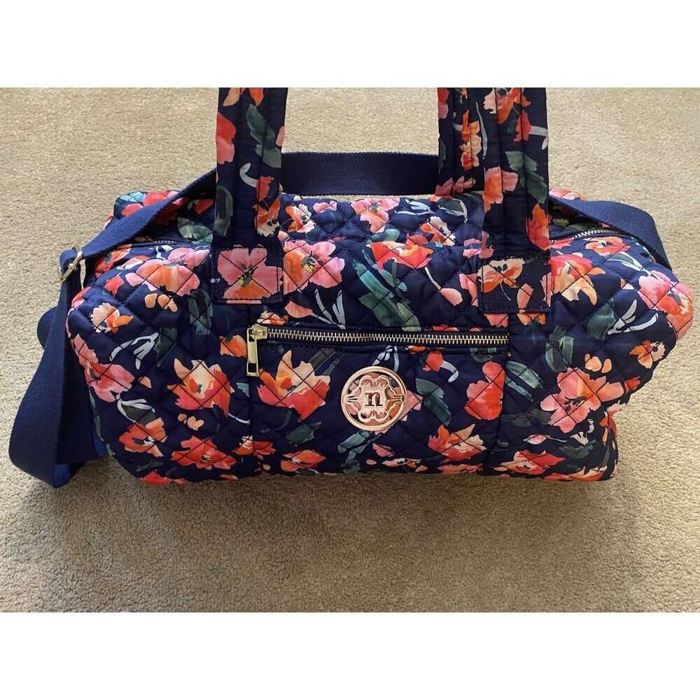 Nanette Lepore Diamond Quilted Washable Duffle Bag in the "Navy Blossom" print